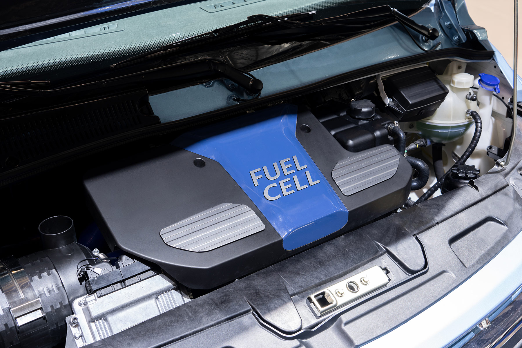 Close-up view of a vehicle-mounted fuel cell power unit with associated components and plumbing, representing the type of hydrogen energy system supported by Steelhead’s custom storage-integrated R&D test skids for fuel cell, electrolyzer, and combustion research.